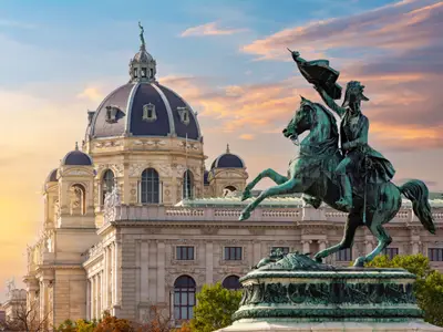Statue of Archduke Charles on Heldenplatz square and Museum of Natural History dome, Vienna, Austria