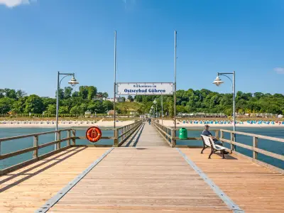 Göhren, Island Rügen, Germany - June 23, 2012: Pier of Göhren, a famous tourist attraction at the beach of the sea spa town