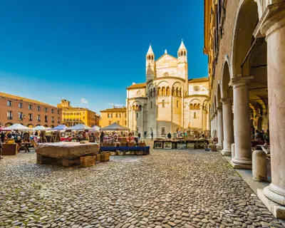 stalls of antique market in the main square of Modena in Italy