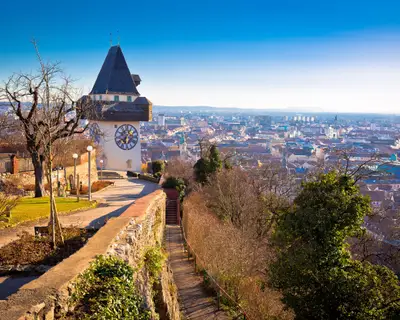 Uhrturm landmark and Graz cityscape aerial view, Styria region of Austria