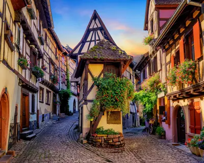 Traditional colorful halt-timbered houses in Eguisheim Old Town on Alsace Wine Route, France