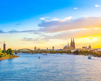 spectacular sunset in cologne with Dome and river Rhine