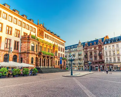 Wiesbaden City Palace Stadtschloss or New Town Hall Rathaus neo-classical building on Schlossplatz Palace Square in historical city centre, blue sky background, State of Hesse, Germany